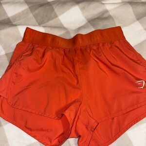 Gymshark orange Athletic Shorts